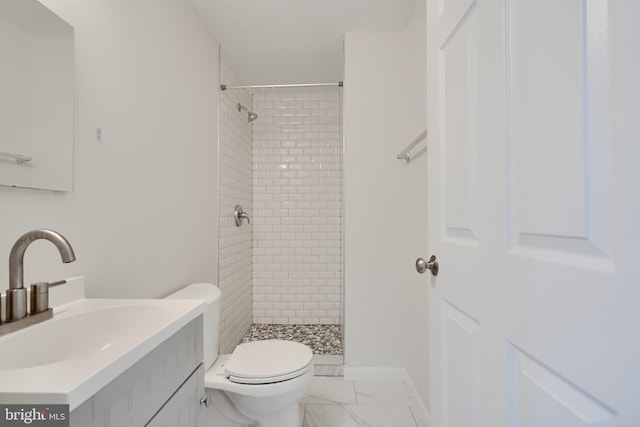8838 Cross Country Pl, Gaithersburg, MD 20879 - bathroom featuring marble finish flooring, toilet, a shower stall, vanity, and baseboards