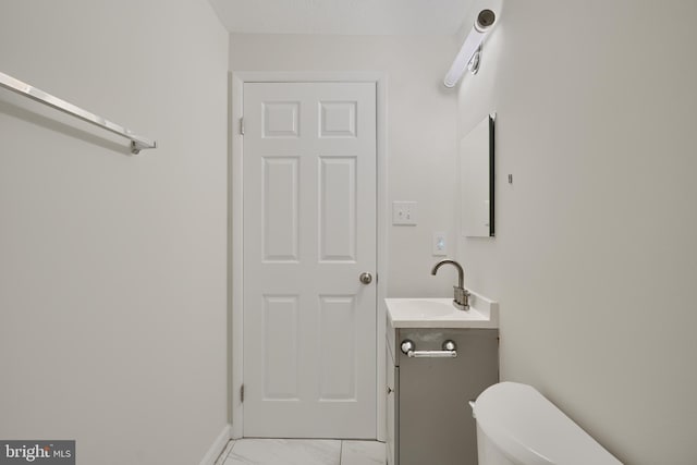 8838 Cross Country Pl, Gaithersburg, MD 20879 - half bath featuring vanity, marble look tiles, and toilet
