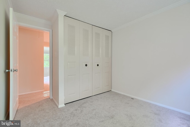 8838 Cross Country Pl, Gaithersburg, MD 20879 - unfurnished bedroom with crown molding, carpet, a closet, and baseboards
