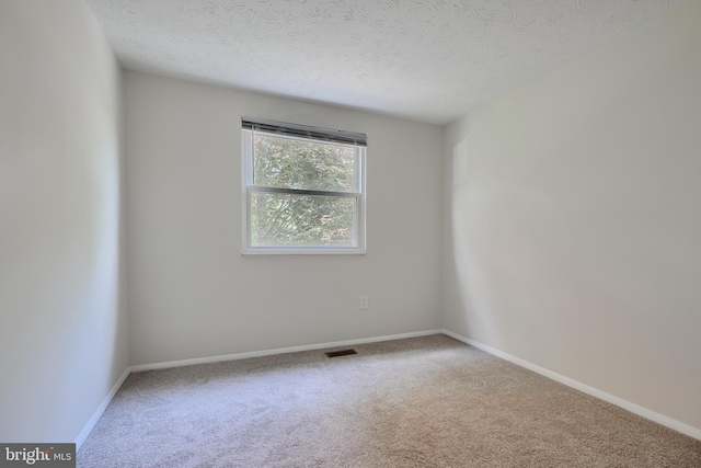 8838 Cross Country Pl, Gaithersburg, MD 20879 - empty room featuring carpet flooring, a textured ceiling, and baseboards