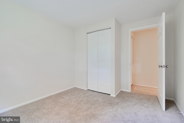 8838 Cross Country Pl, Gaithersburg, MD 20879 - unfurnished bedroom featuring carpet flooring, a closet, and baseboards