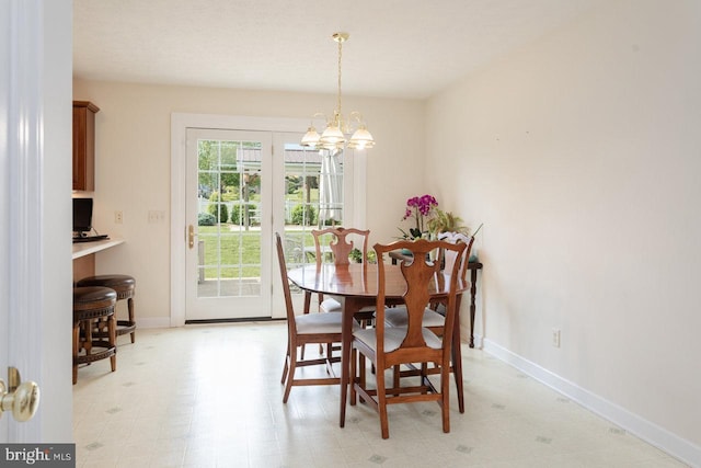 2799 Greenway Ct, Rockingham, VA 22802 - dining room with a chandelier, baseboards, and light flooring