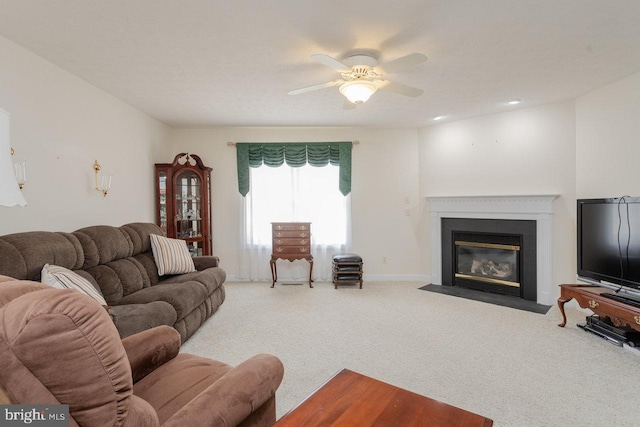 2799 Greenway Ct, Rockingham, VA 22802 - carpeted living room with ceiling fan, a fireplace with flush hearth, and baseboards