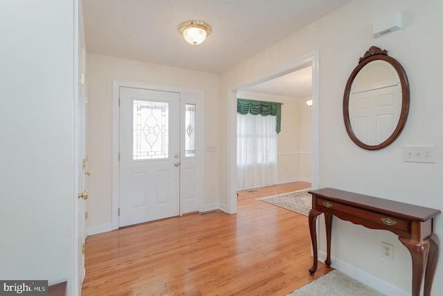 2799 Greenway Ct, Rockingham, VA 22802 - entrance foyer with plenty of natural light, light wood finished floors, and baseboards