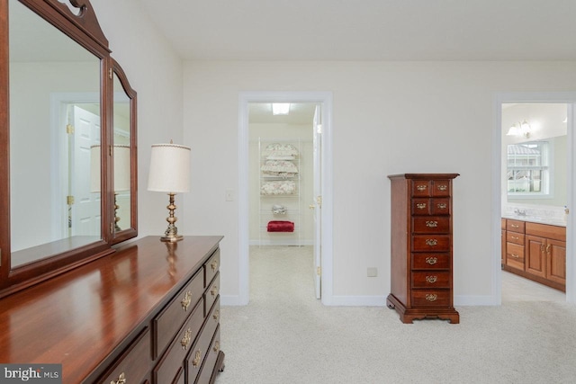 2799 Greenway Ct, Rockingham, VA 22802 - bedroom featuring light colored carpet, connected bathroom, and baseboards