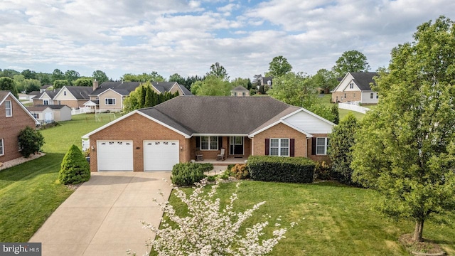 2799 Greenway Ct, Rockingham, VA 22802 - ranch-style house featuring brick siding, covered porch, an attached garage, and driveway