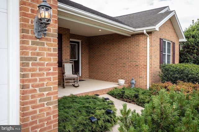 2799 Greenway Ct, Rockingham, VA 22802 - property entrance featuring brick siding and roof with shingles