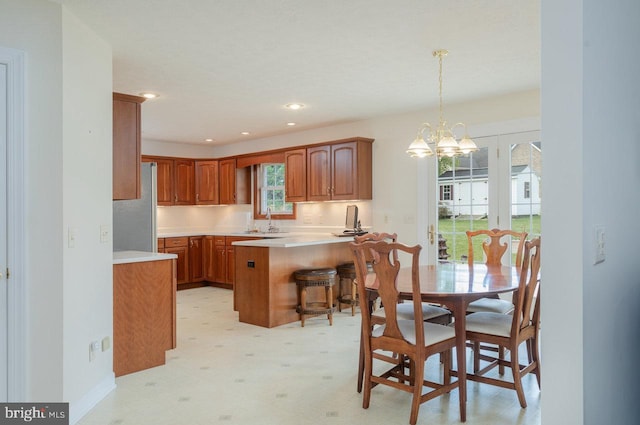 2799 Greenway Ct, Rockingham, VA 22802 - dining space featuring light floors, a chandelier, recessed lighting, and baseboards