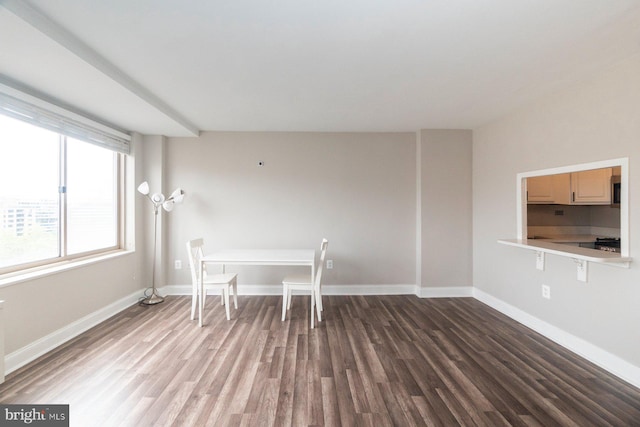 922 24th St NW Unit 806, Washington, DC 20037 - unfurnished dining area with wood finished floors and baseboards
