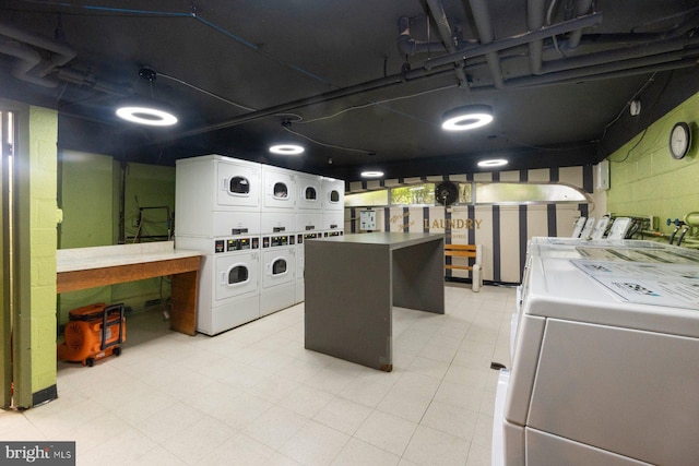 922 24th St NW Unit 806, Washington, DC 20037 - communal laundry room with stacked washer / dryer