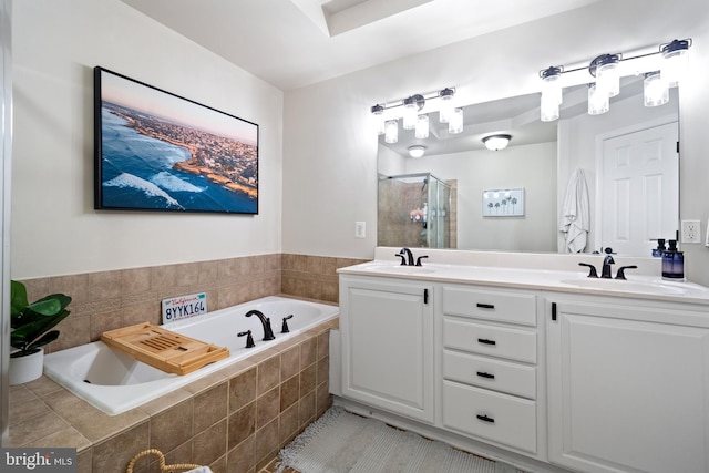 7135 Huntley Creek Pl Unit 55, Alexandria, VA 22306 - bathroom featuring a bath, a stall shower, double vanity, and tile patterned flooring