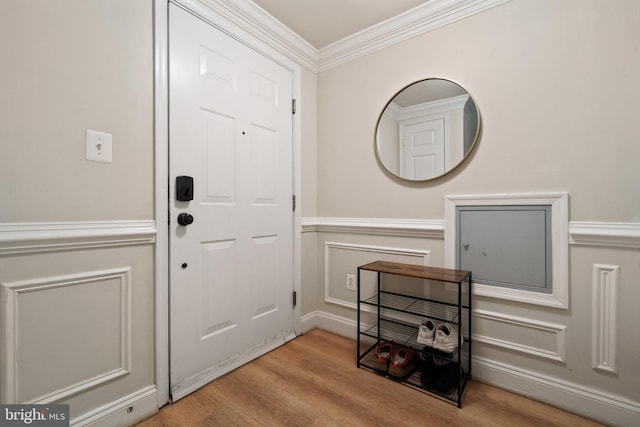 7135 Huntley Creek Pl Unit 55, Alexandria, VA 22306 - entryway with wood finished floors, ornamental molding, wainscoting, and a decorative wall
