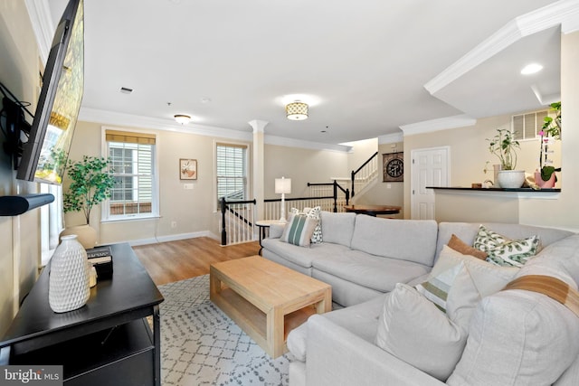 7135 Huntley Creek Pl Unit 55, Alexandria, VA 22306 - living room with wood finished floors, ornamental molding, baseboards, and stairway