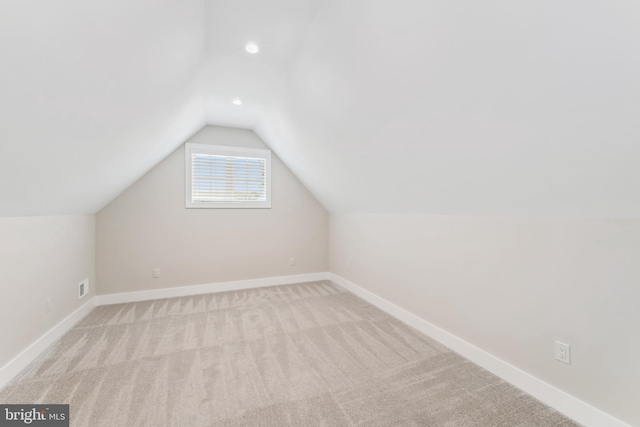 bonus room with vaulted ceiling, carpet, baseboards, and recessed lighting