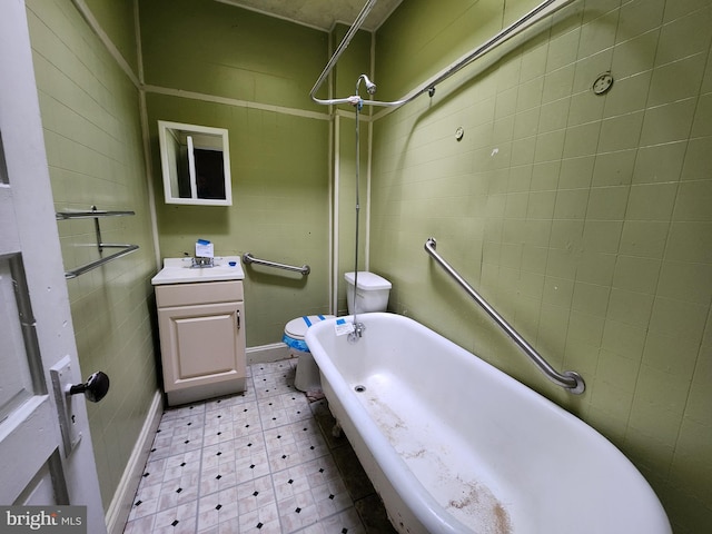 full bathroom featuring tile patterned floors, a bathtub, a shower, and vanity