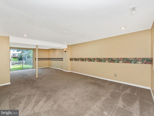 carpeted spare room with baseboards and recessed lighting