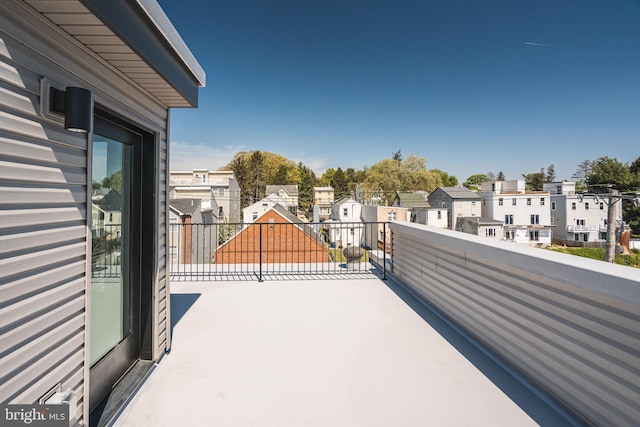balcony featuring a residential view