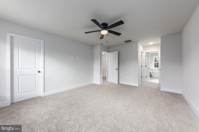 22 Clydesdale Rd, Fredericksburg, VA 22405 - unfurnished bedroom featuring baseboards, light colored carpet, and connected bathroom