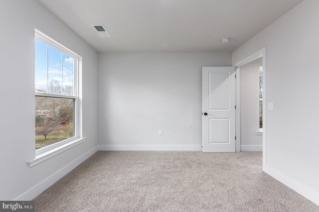 22 Clydesdale Rd, Fredericksburg, VA 22405 - empty room featuring healthy amount of natural light, carpet, baseboards, and a smoke detector