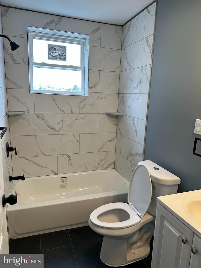 124 E Ruscomb St, Philadelphia, PA 19120 - full bath with tile patterned floors, toilet, vanity, and shower / bath combination