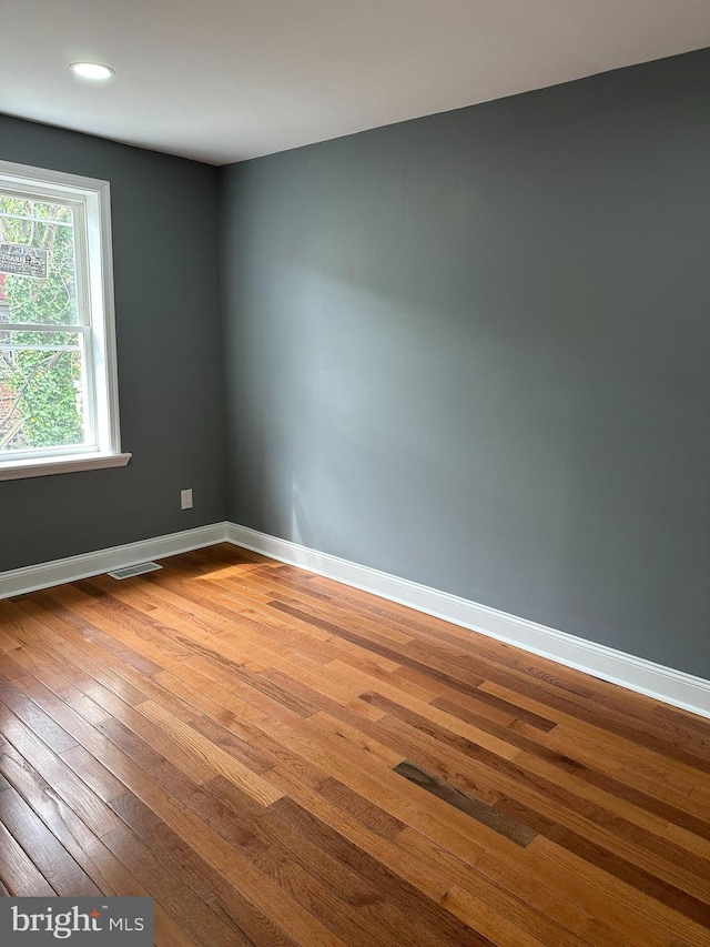 124 E Ruscomb St, Philadelphia, PA 19120 - unfurnished room featuring wood-type flooring, baseboards, and recessed lighting