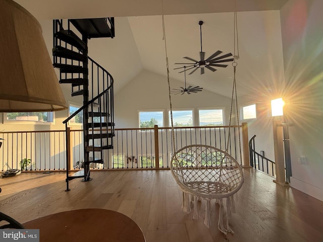 6010 Martinsburg Rd, Berkeley Springs, WV 25411 - dining area featuring a ceiling fan, wood finished floors, and high vaulted ceiling