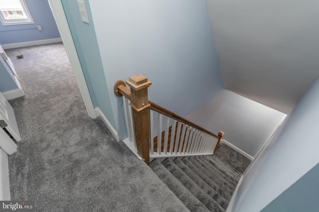 3211 Baker St, Baltimore, MD 21216 - stairway featuring carpet and baseboards