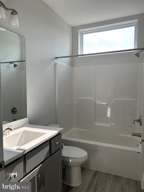 112 Amberfield Ct, Winchester, VA 22602 - full bathroom featuring toilet, vanity, wood finished floors, and bathing tub / shower combination