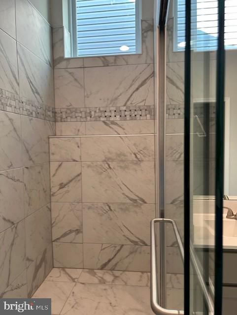 112 Amberfield Ct, Winchester, VA 22602 - full bath with a shower stall, healthy amount of natural light, and vanity
