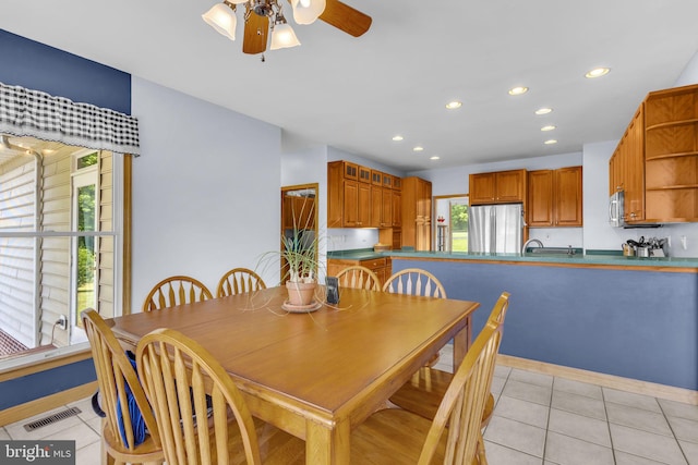10150 Lapworth Pl, Charlotte Hall, MD 20622 - dining area featuring a ceiling fan, light tile patterned floors, recessed lighting, and baseboards