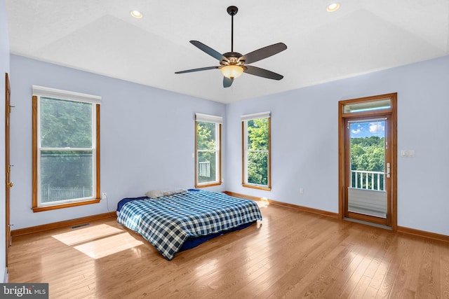 10150 Lapworth Pl, Charlotte Hall, MD 20622 - bedroom with baseboards, access to outside, multiple windows, wood finished floors, and recessed lighting