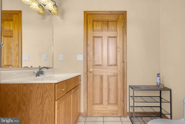 10150 Lapworth Pl, Charlotte Hall, MD 20622 - bathroom featuring vanity, a chandelier, and tile patterned floors