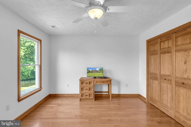 10150 Lapworth Pl, Charlotte Hall, MD 20622 - unfurnished office with light wood-type flooring, a textured ceiling, ceiling fan, and baseboards