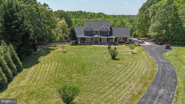 10150 Lapworth Pl, Charlotte Hall, MD 20622 - view of front of house with a porch and a wooded view