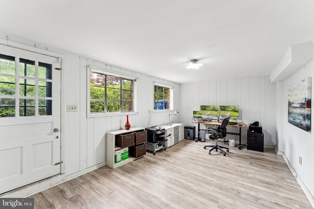 office space with light wood-style floors