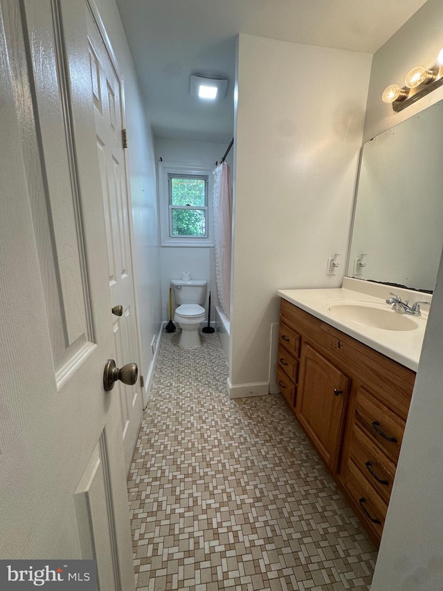 6708 Calmos St, Capitol Heights, MD 20743 - full bath with toilet, vanity, baseboards, tile patterned floors, and shower / bath combo