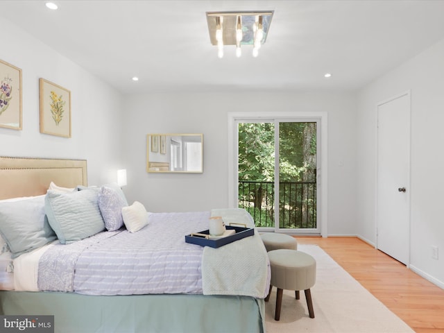 bedroom featuring wood finished floors and recessed lighting
