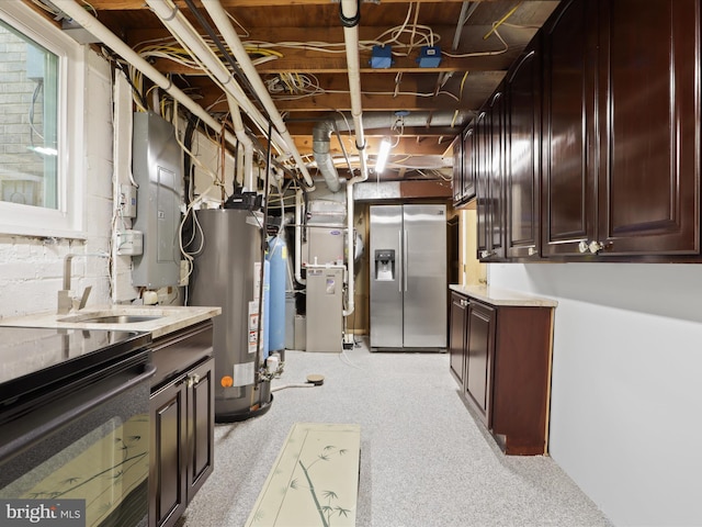 below grade area featuring water heater, stainless steel fridge, electric panel, heating unit, and a sink
