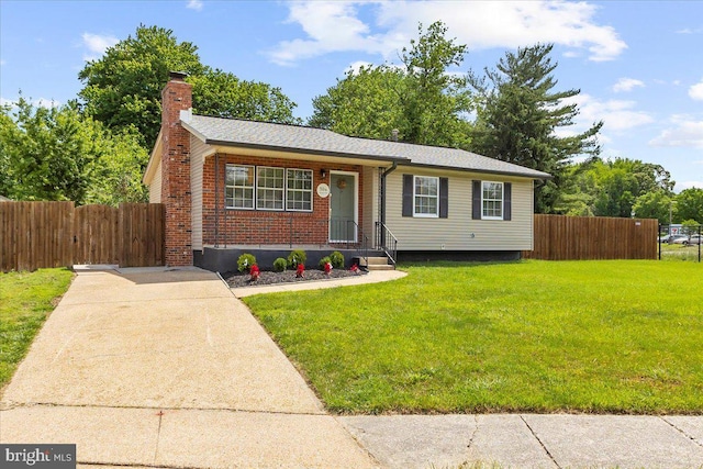 504 Kenora Dr, Millersville, MD 21108 - view of front of home with a chimney and brick siding