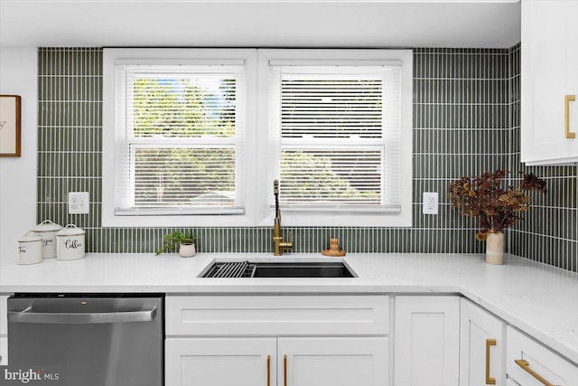 504 Kenora Dr, Millersville, MD 21108 - kitchen with dishwasher, a sink, decorative backsplash, and white cabinetry