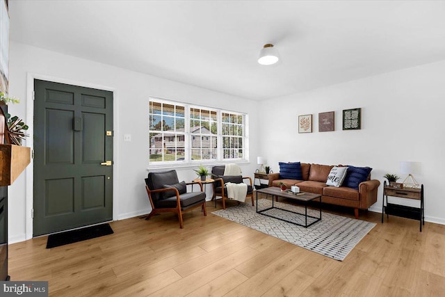 504 Kenora Dr, Millersville, MD 21108 - living room with light wood finished floors and baseboards