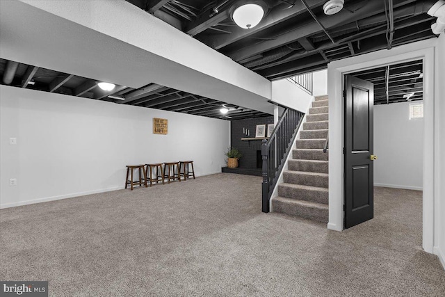 504 Kenora Dr, Millersville, MD 21108 - below grade area featuring stairway, carpet floors, and baseboards