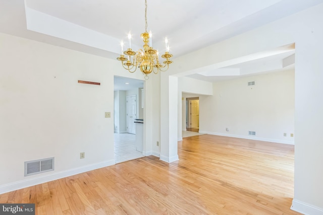 2 Larch Way, Princeton, NJ 08540 - empty room featuring a chandelier and light wood-style floors