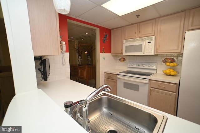3201 Centennial Sta, Warminster, PA 18974 - kitchen featuring white appliances, a sink, light countertops, a drop ceiling, and decorative backsplash