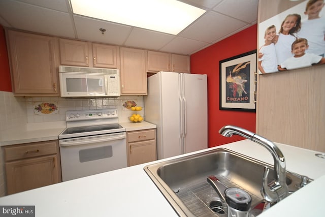 3201 Centennial Sta, Warminster, PA 18974 - kitchen featuring white appliances, a sink, a drop ceiling, light countertops, and backsplash