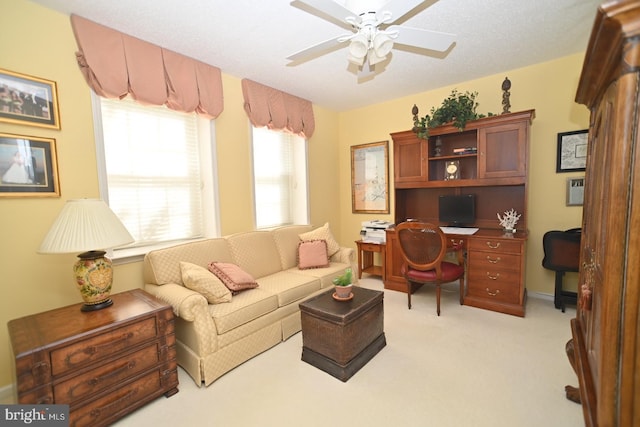 3201 Centennial Sta, Warminster, PA 18974 - living room featuring light carpet, a desk, and a ceiling fan