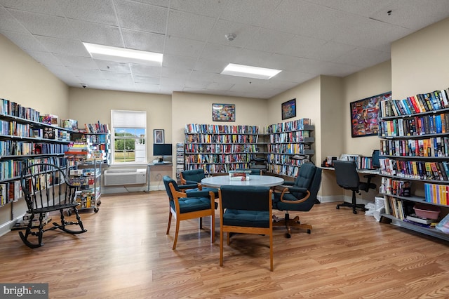 3201 Centennial Sta, Warminster, PA 18974 - office space with wall of books, wood finished floors, a wall mounted AC, baseboards, and a drop ceiling