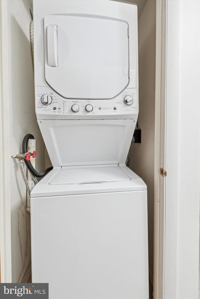 laundry area featuring estacked washer and dryer