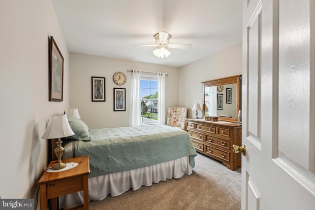 carpeted bedroom featuring a ceiling fan
