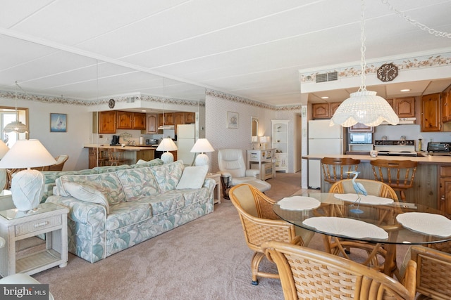 6109 Atlantic Ave Unit 201, Ocean City, MD 21842 - dining area featuring light colored carpet and plenty of natural light